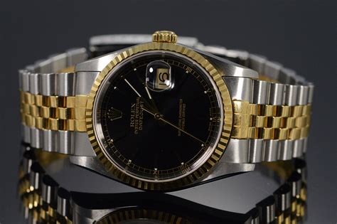 rolex oyster perpetual black face gold|oyster perpetual rolex price.